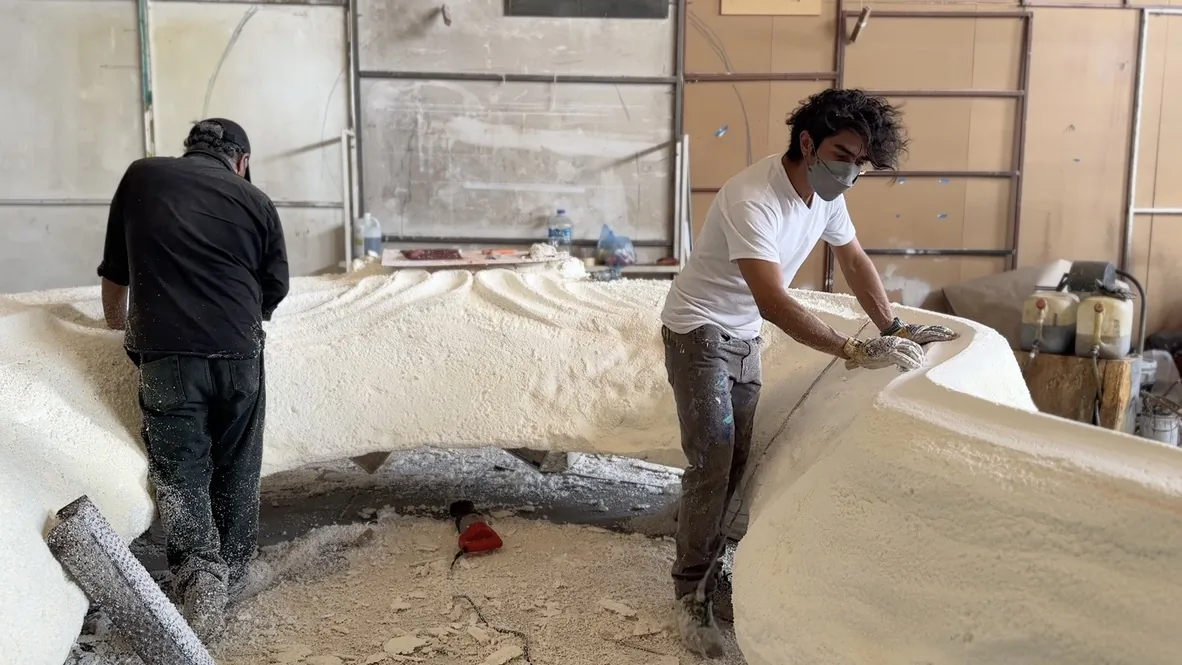 SUERTE — Roughing out the terrain: foam, sandpaper and two pairs of hands