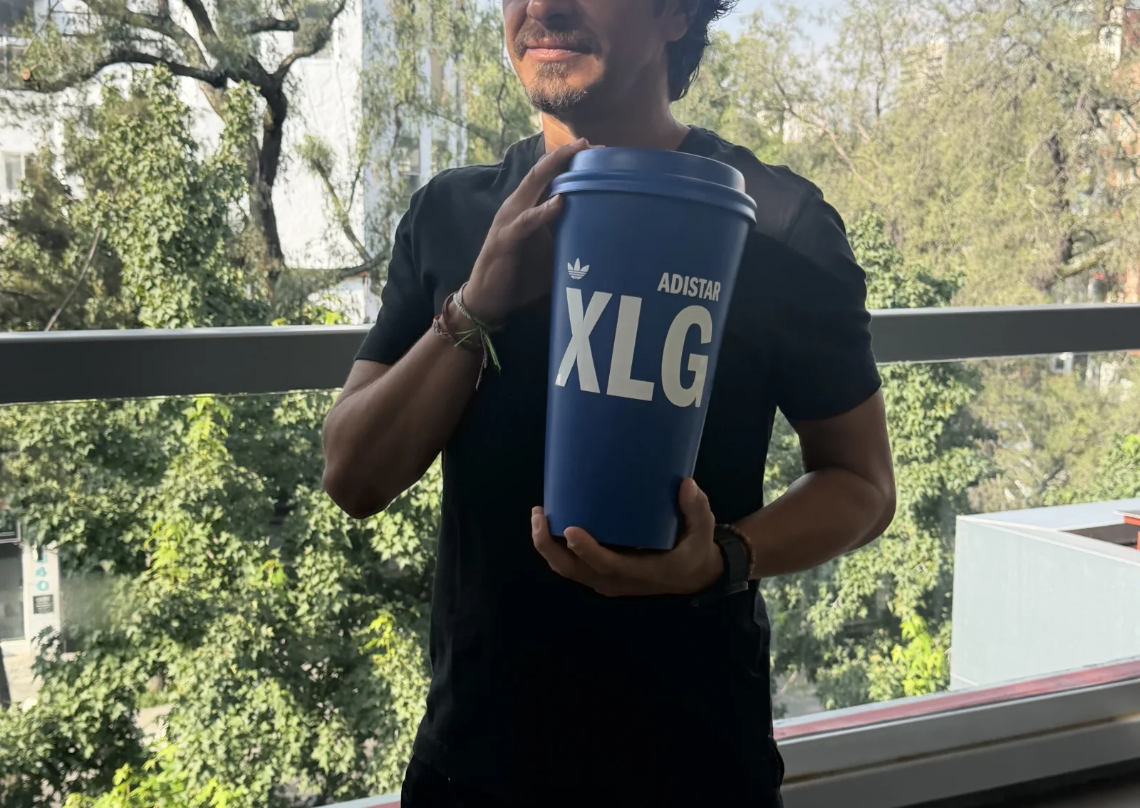 ADIDAS — The XLG cup out of proportion, held in both arms
