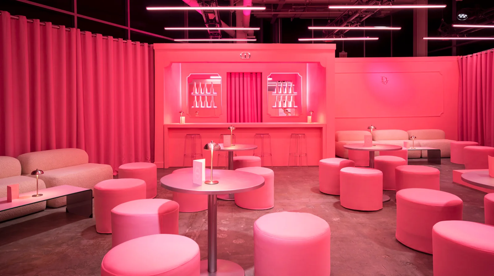 DIOR ADDICT — The lounge: curtains, poufs and the bar, all in the same pink