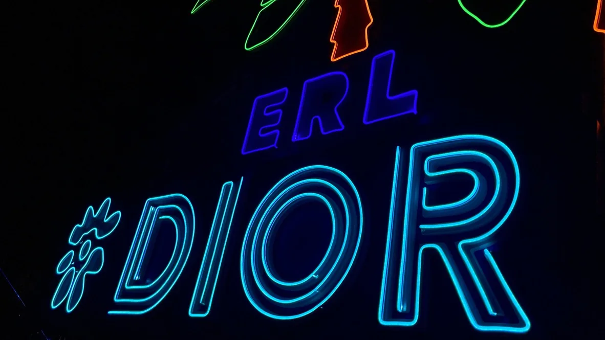 DIOR HOMME — ERL × DIOR in neon on black