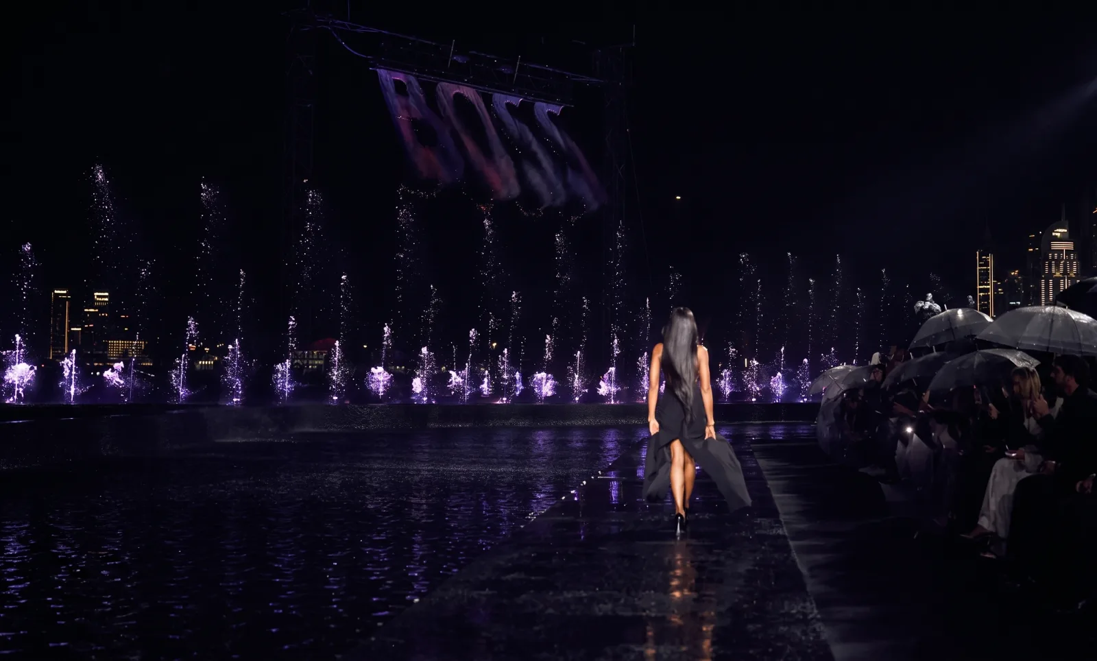 BOSS — The water runway, the signature projected at the far end