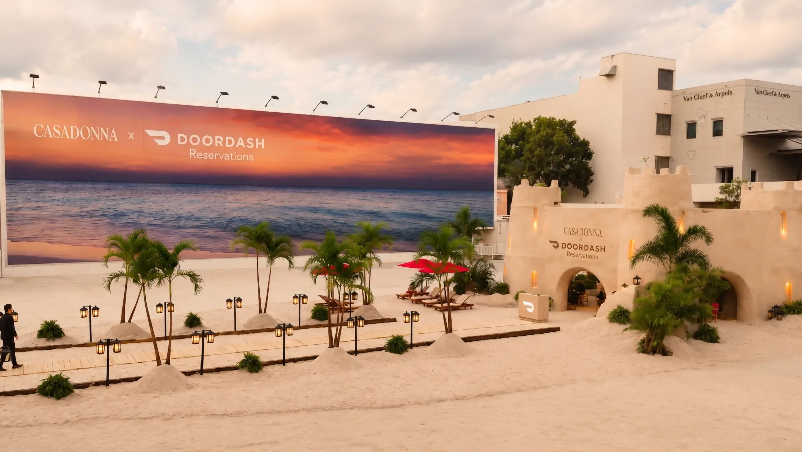 DOORDASH — Casadonna × DoorDash: the billboard over the sand, red umbrellas below