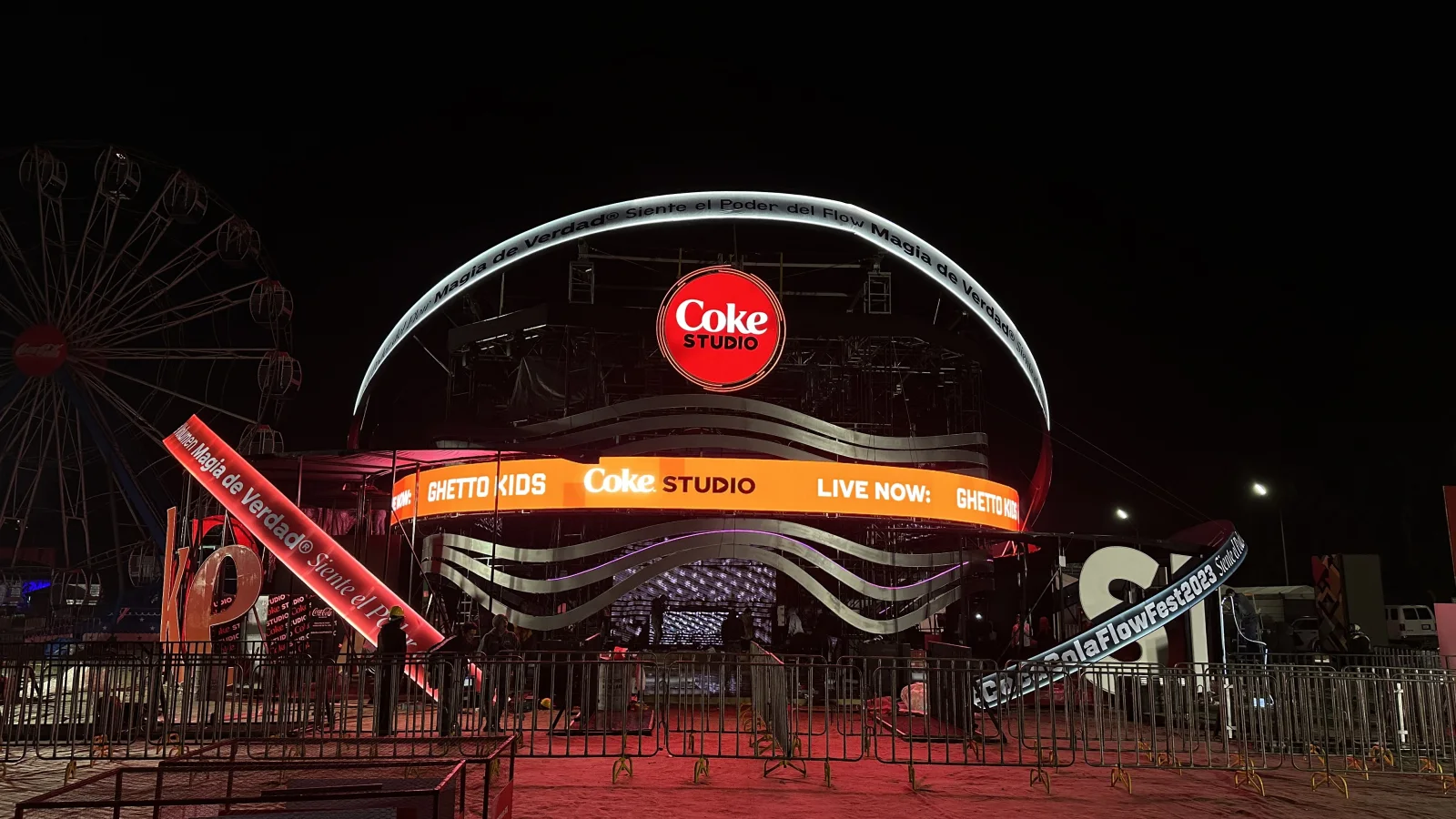 FLOW FEST — The dome live, at night: Coke Studio lit up and the wheel behind