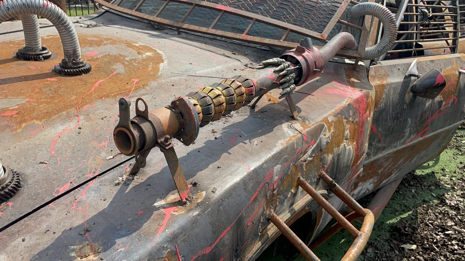 SIX FLAGS — Set 1 · The rusted machinery up close: pipes, rust and painted blood