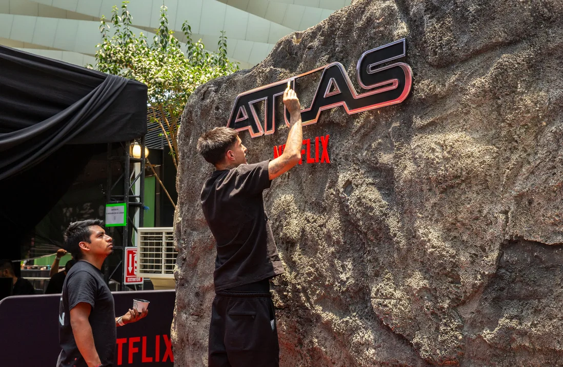 ATLAS — Painting the ATLAS sign on the rock, by hand