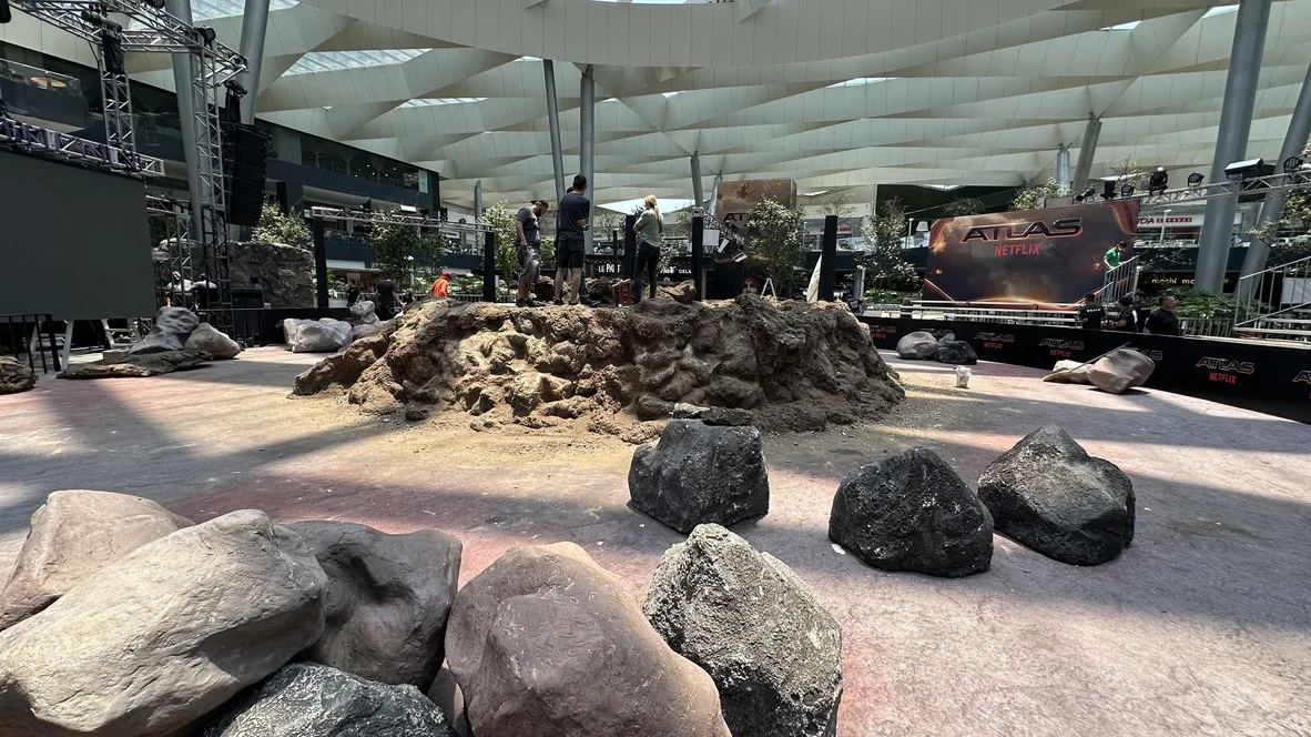ATLAS — The terrain ready: rocks, sand and the wall of screens
