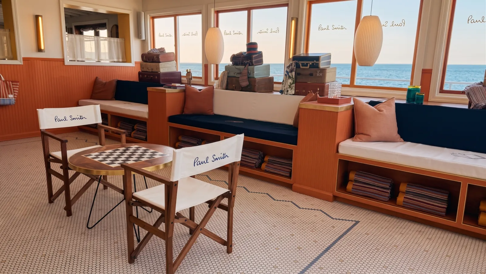 PAUL SMITH — The orange lounge, the checkers table and the sea in the windows