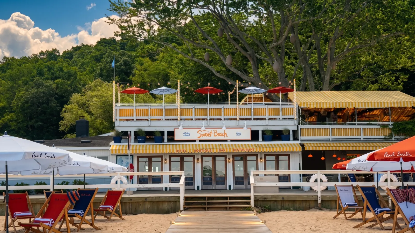 PAUL SMITH — Sunset Beach: the beach house, the sand and the chairs